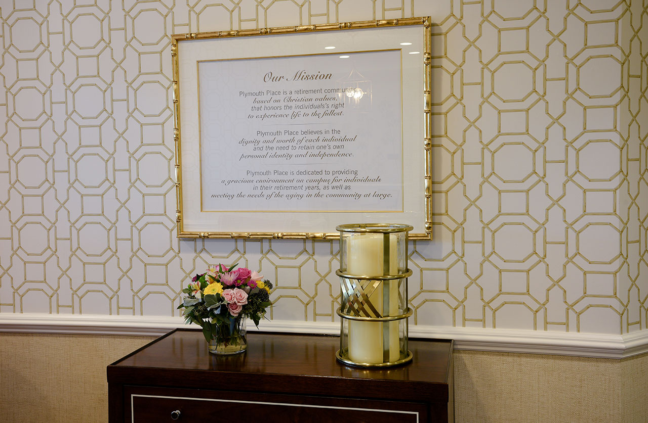 Photo of a framed picture of our mission statement